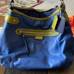 blue and green coach bag/wallet
